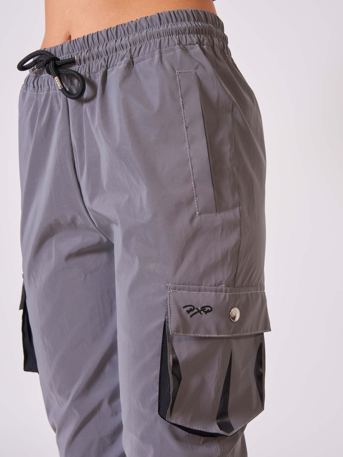 bas-de-jogging-poches-oversize-reflechissant