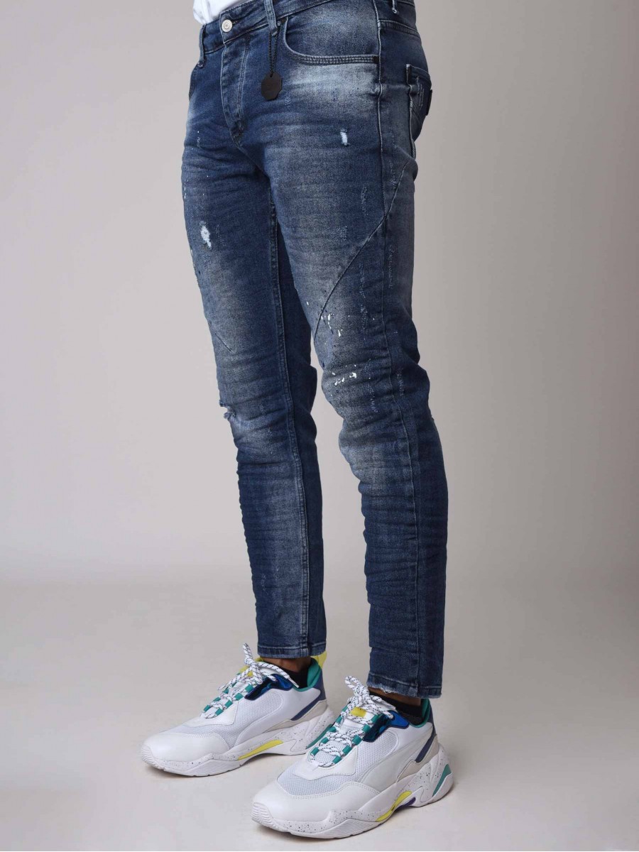 Jeans pitillo azules con efecto desteñido y moteado