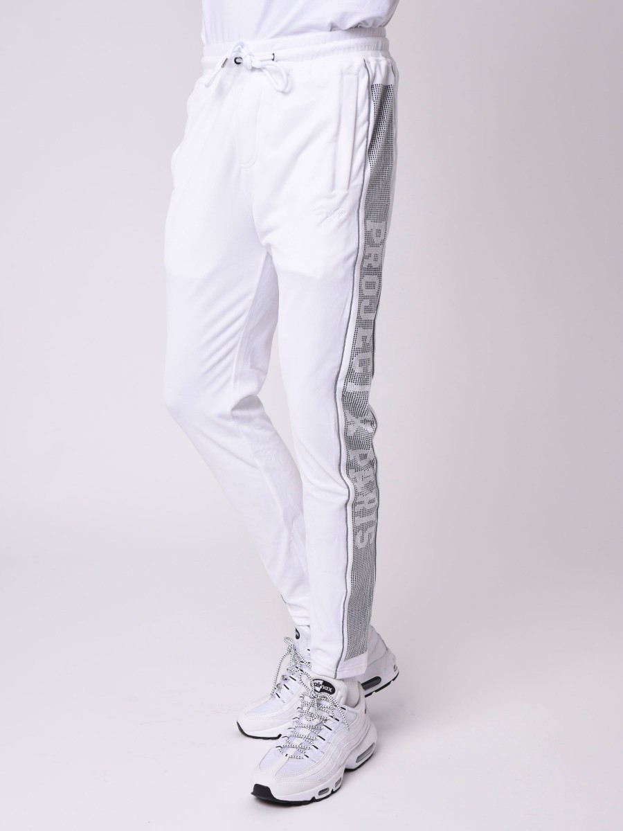 Jogging pants with rhinestone logo band on the side