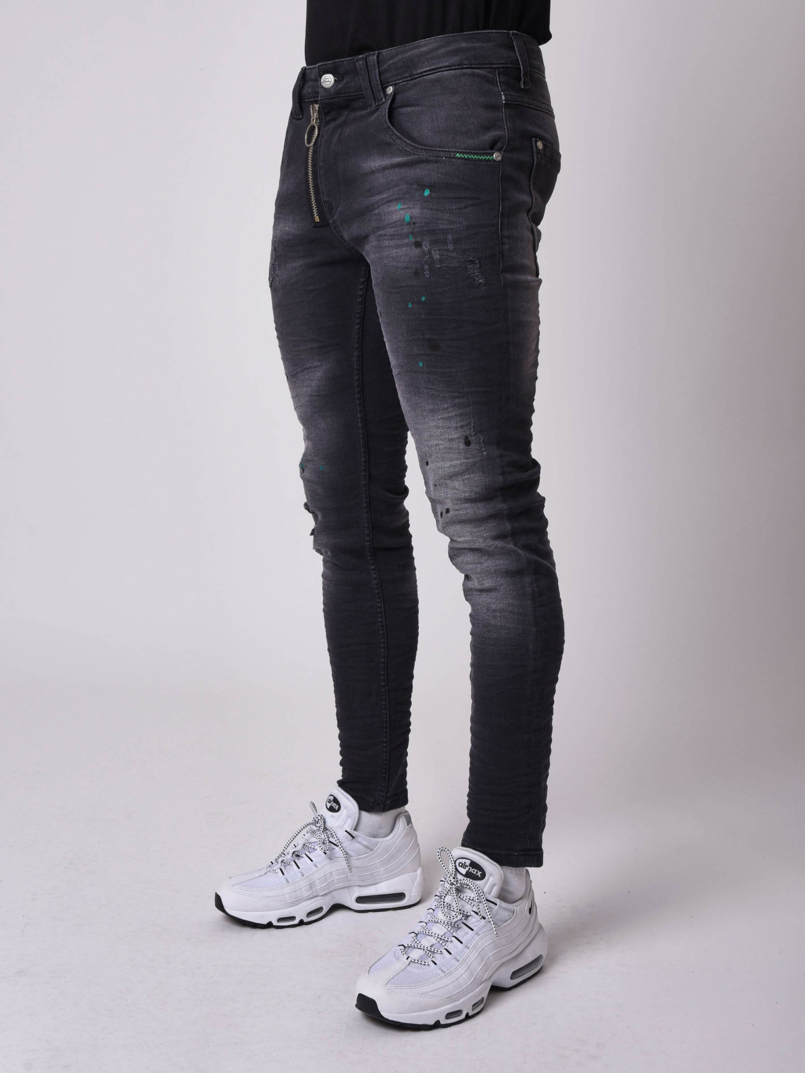 Washed Black Skinny Jeans With Visible Zipper