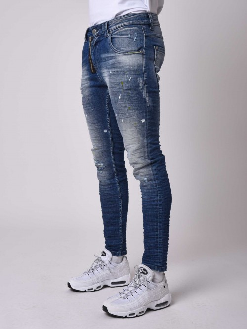 Blue wash skinny fit jeans with pale yellow speckles, exposed zipper