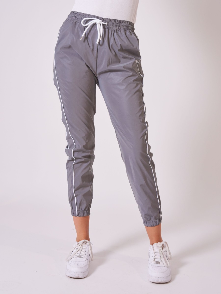 Reflective elasticated jogging bottoms with piping