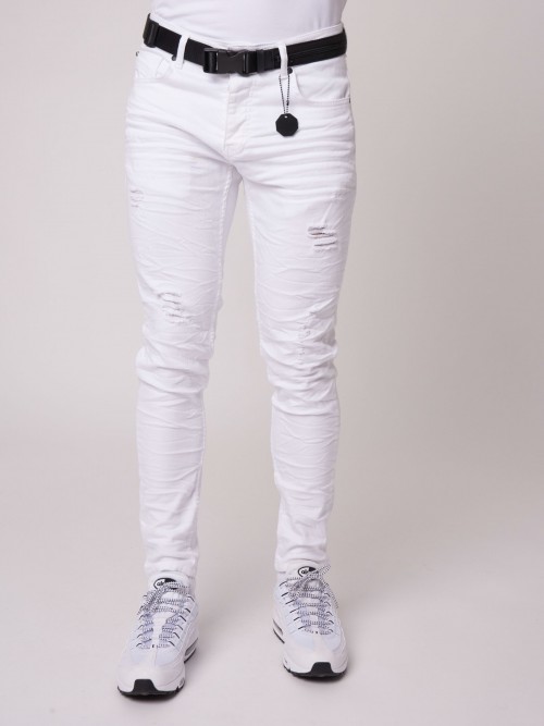 Worn-effect skinny jeans with holes - White