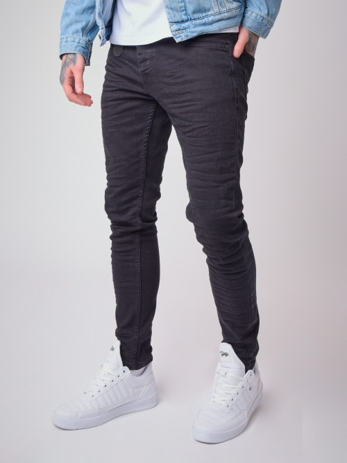 Jeans slim fit con efecto arrugado - Negro