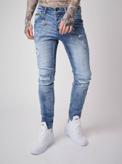 Jeans pitillo con efecto desgastado y arañado - Azul