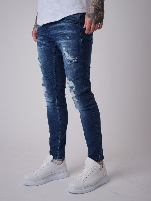 Jeans slim azules con efecto desgastado - Azul