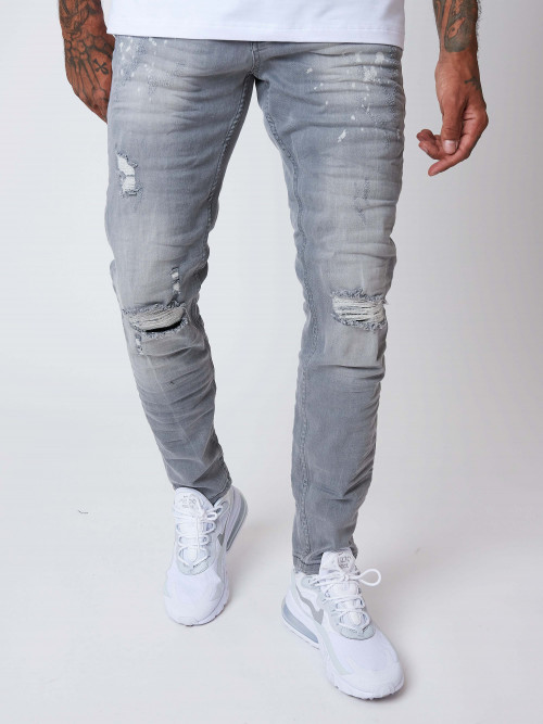 Worn effect slim jeans with faded spots - Light grey