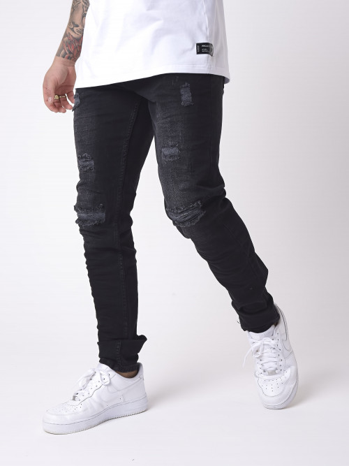 Jeans slim efecto desteñido y desgastado con agujeros negros - Negro