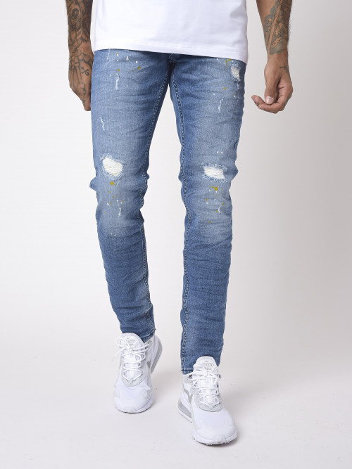 Schmale Basic-Jeans in Blau mit Used-Effekt und Fleckenmuster - Blau