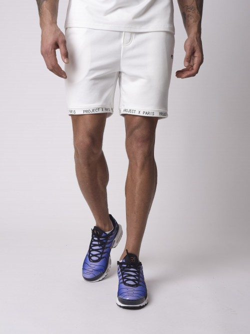Yoke shorts with text message - White