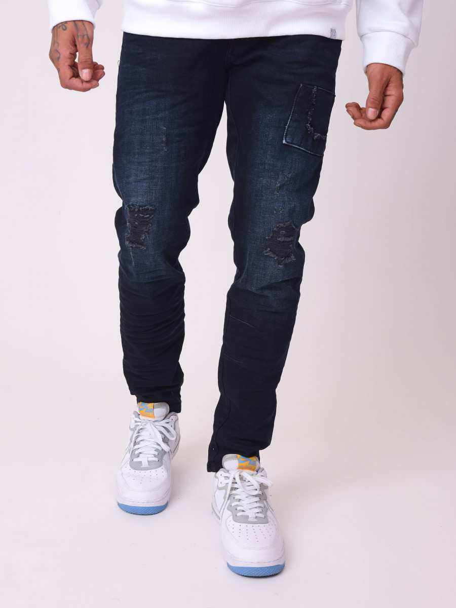 Jeans pitillo azul crudo con canesú de efecto desgastado