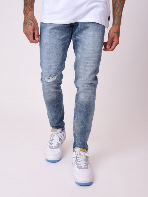 Jeans pitillo azules lavados con agujero - Azul