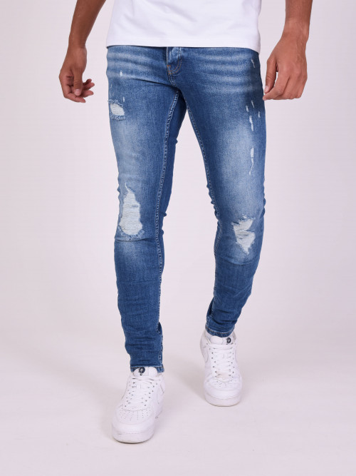Jeans pitillo lavados en lejía - Azul