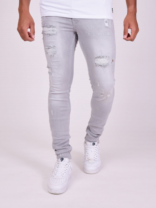 Jeans skinny effetto consumato - Grigio chiaro