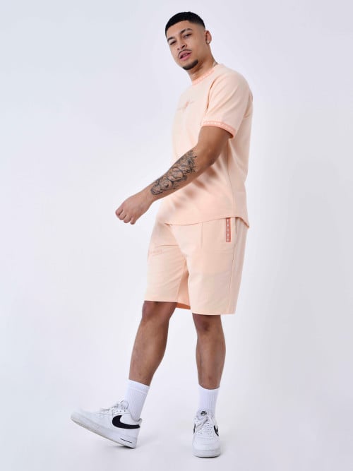 Einfarbige Shorts mit Logo-Streifen - Pale peach