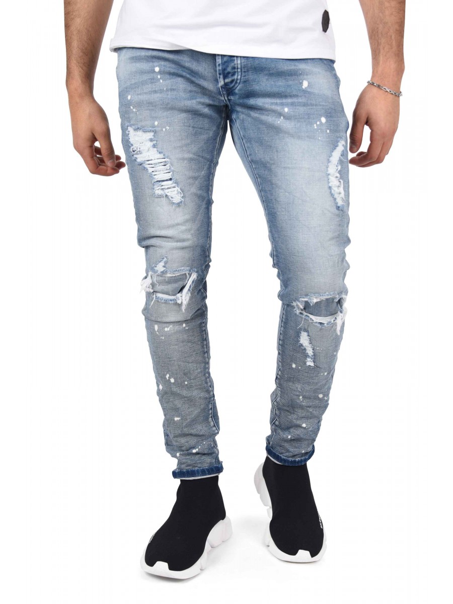 Jeans pitillo elásticos con lavado jaspeado