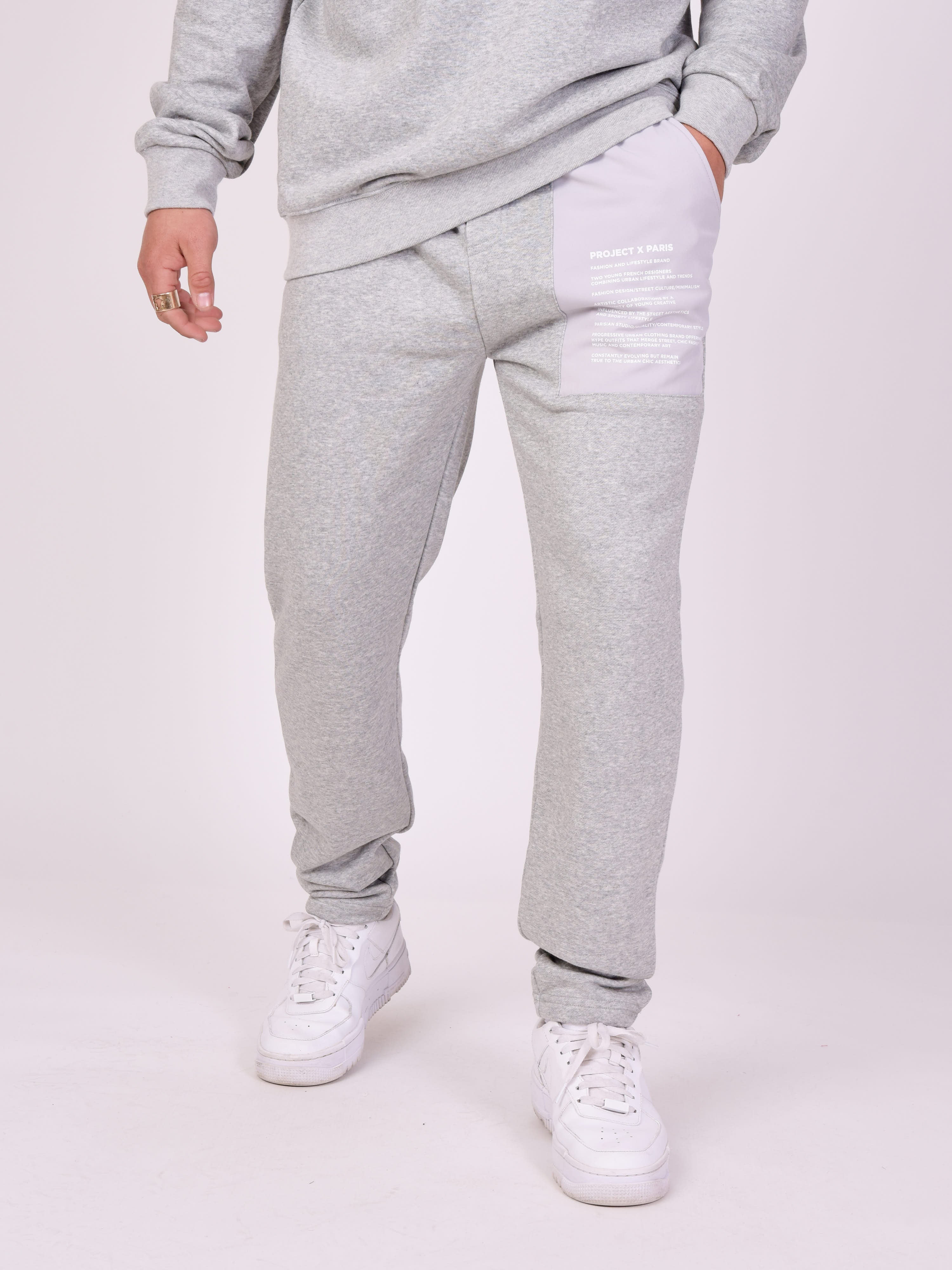 Jogging bottoms with text panel-1
