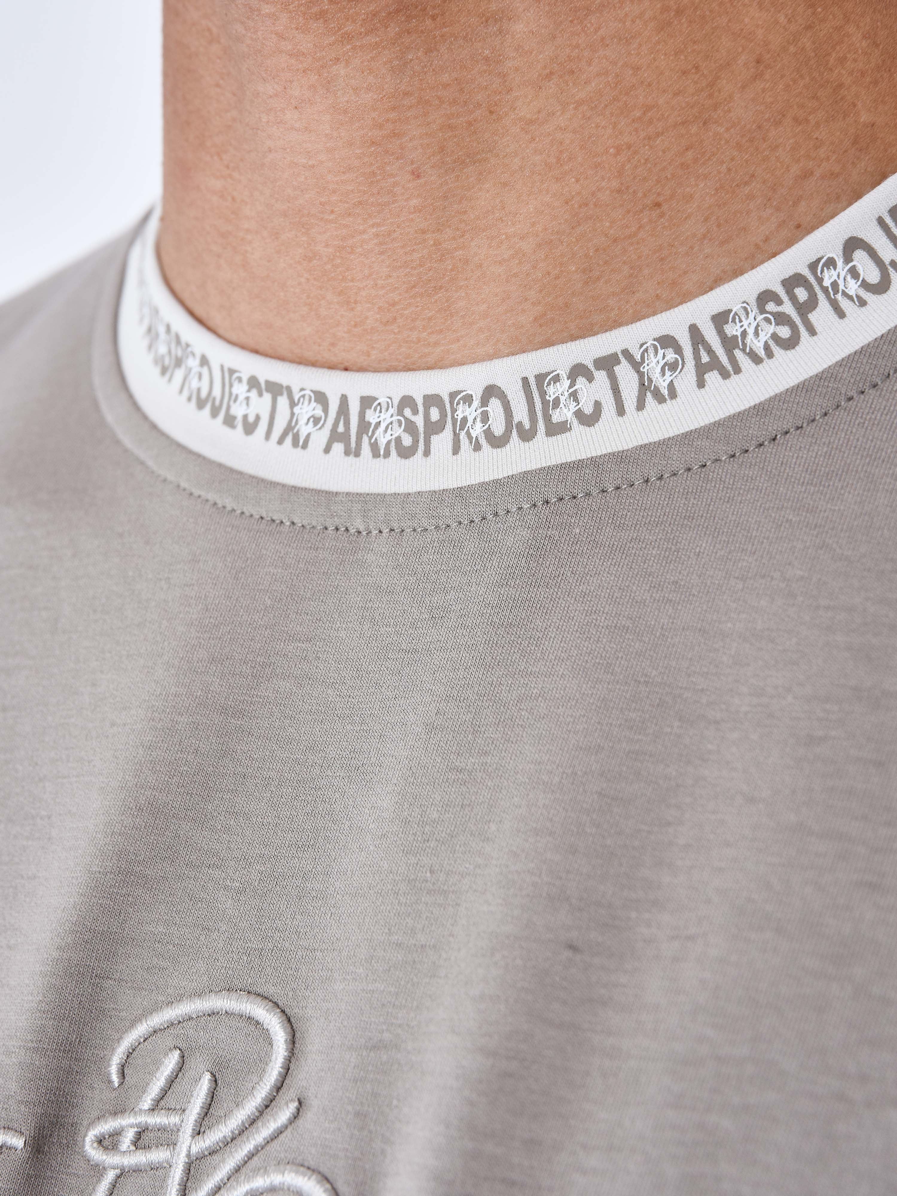 Effen T-shirt met logoband-7