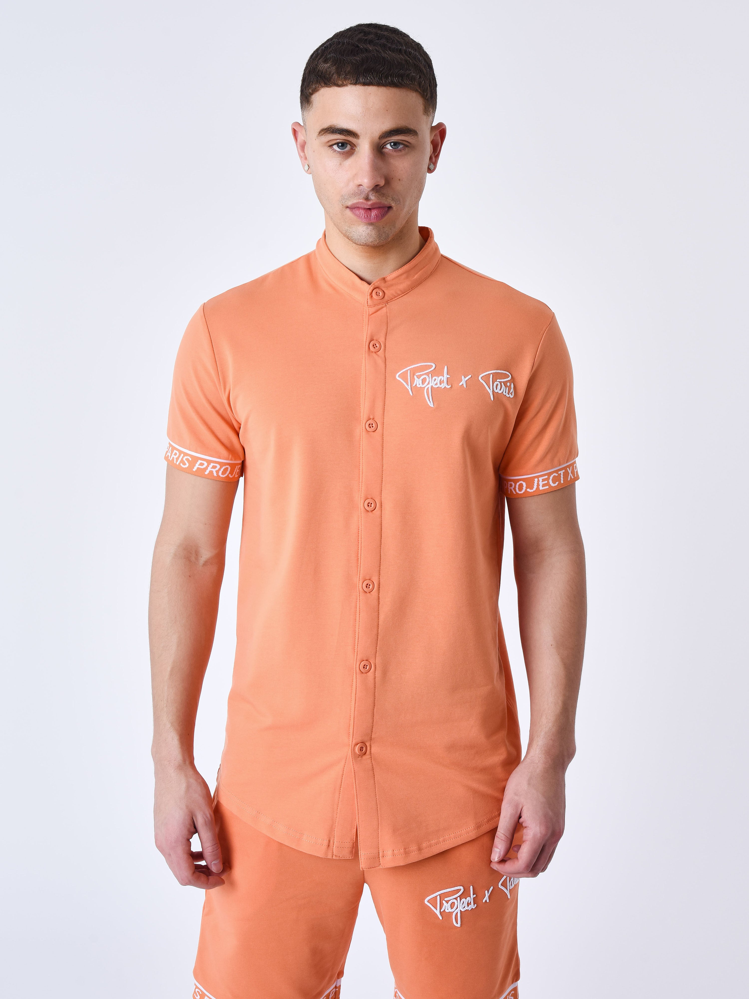 Short-sleeve shirt with embossed embroidered logo-2