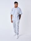 Pantaloni da jogging con motivo colombe