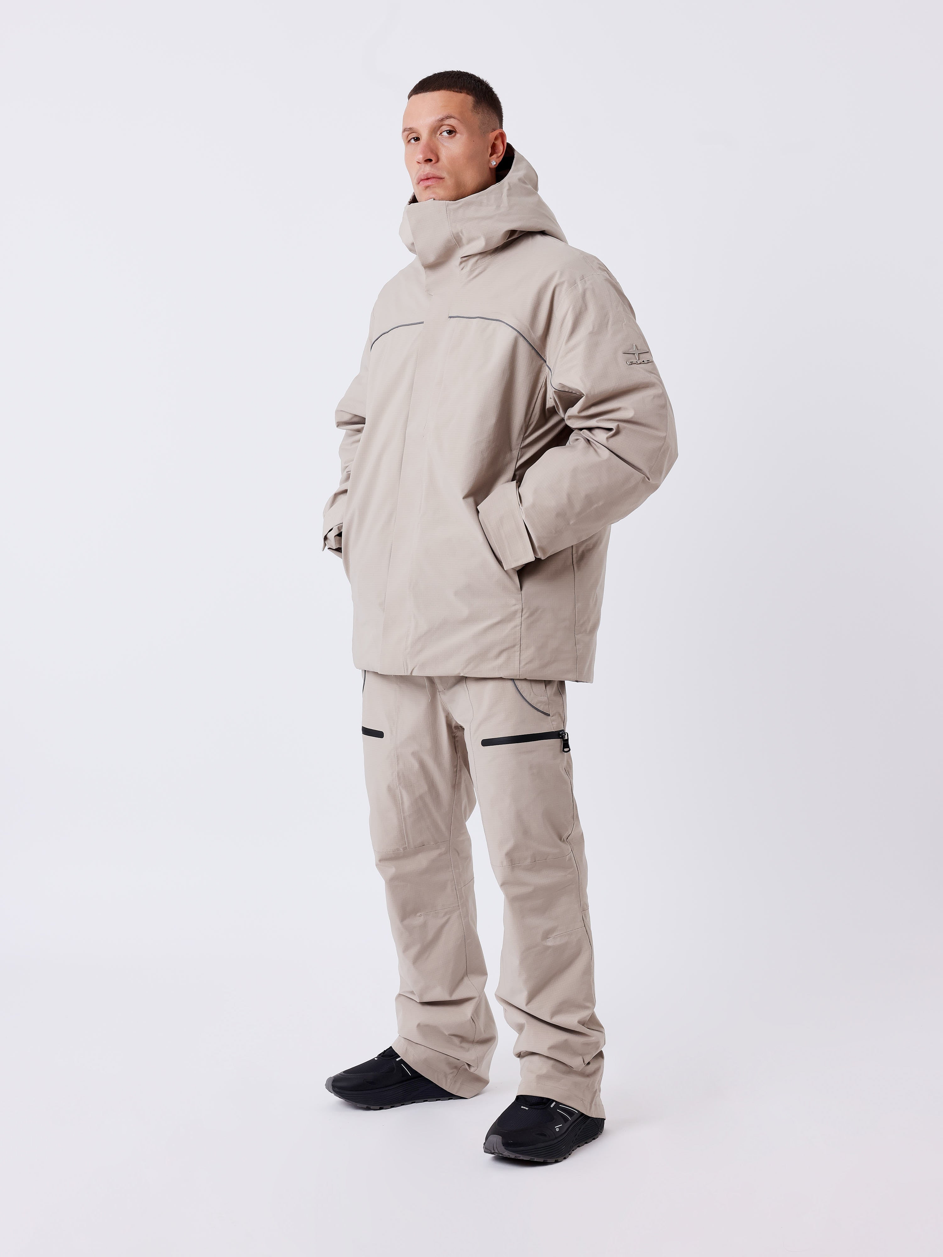 Waterproof ski pants filled with down-1