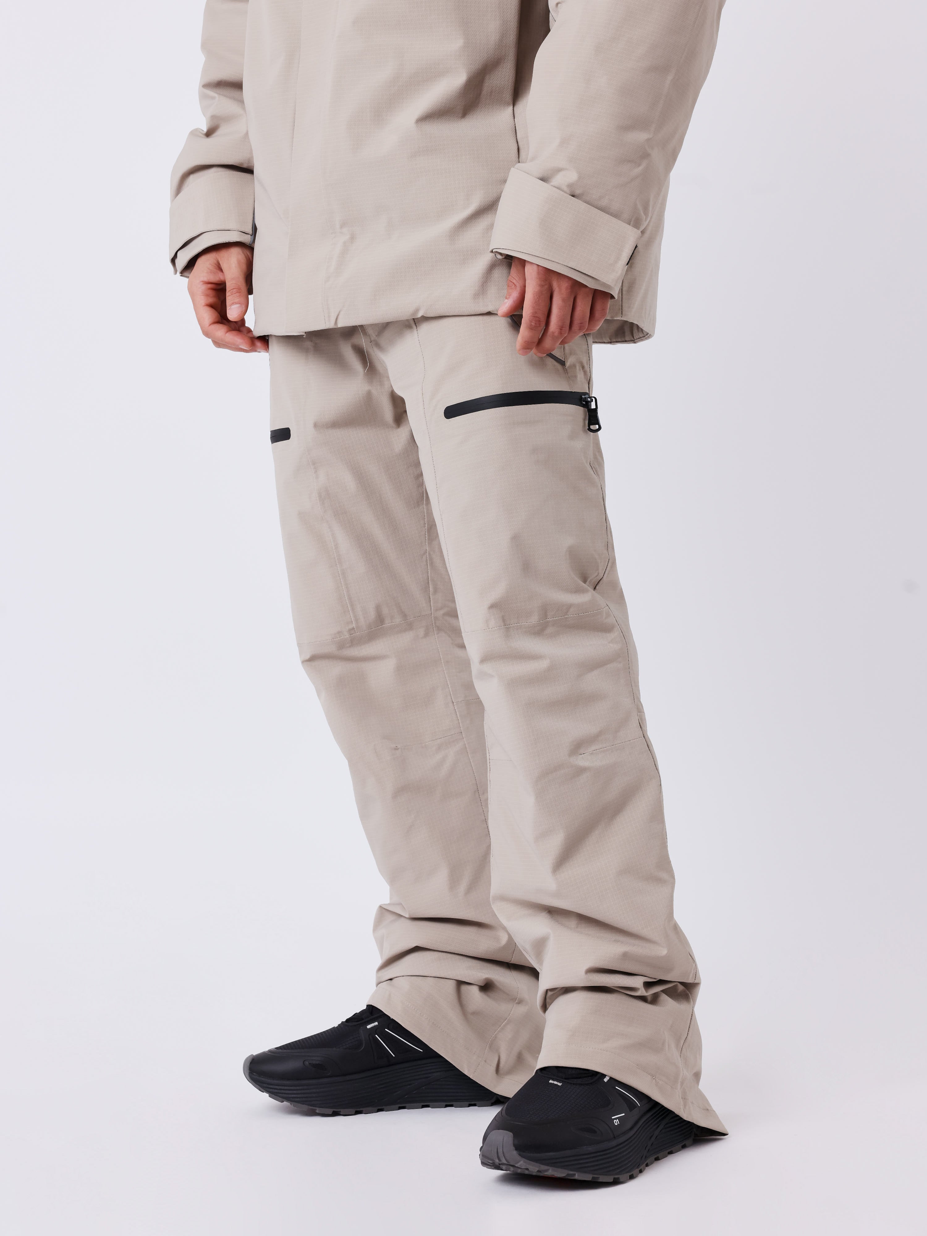 Waterproof ski pants filled with down-3