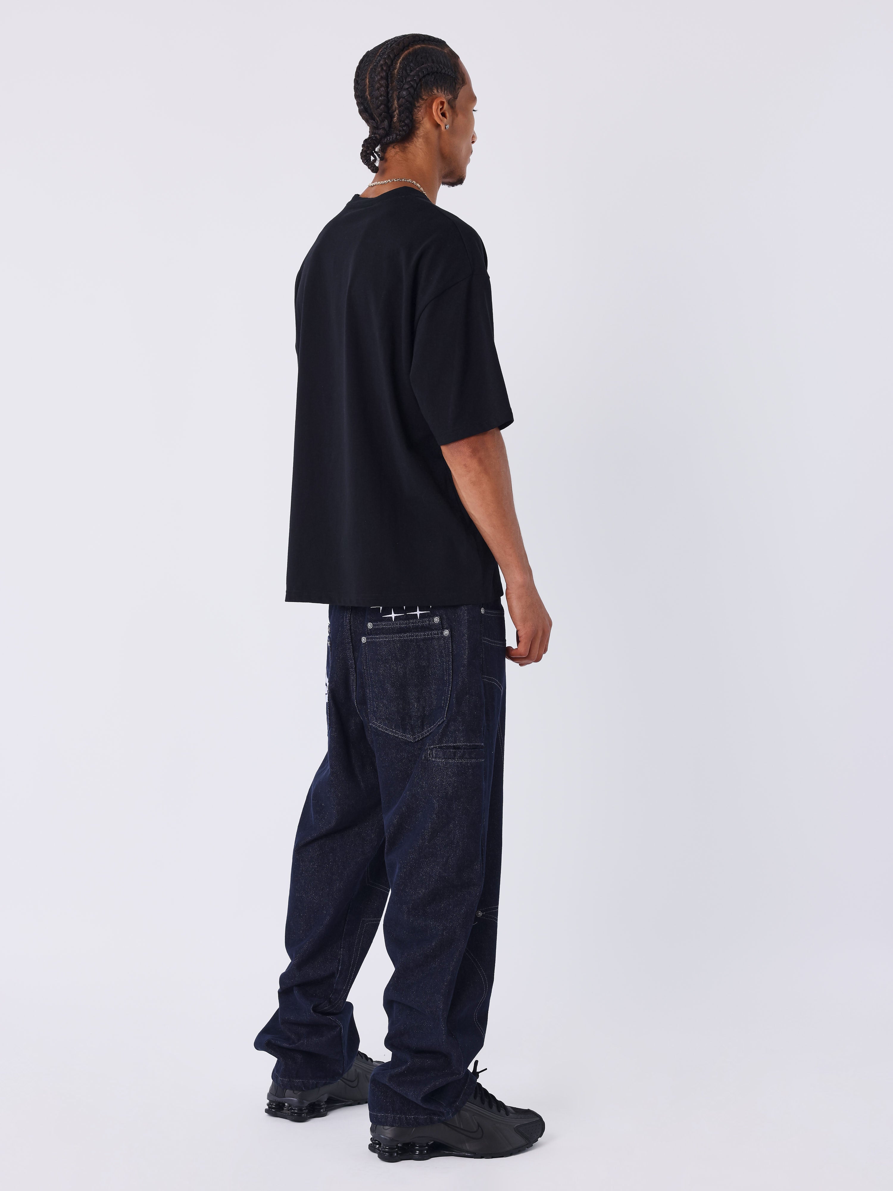 Jeans loose em denim cru com costuras Polaris-2