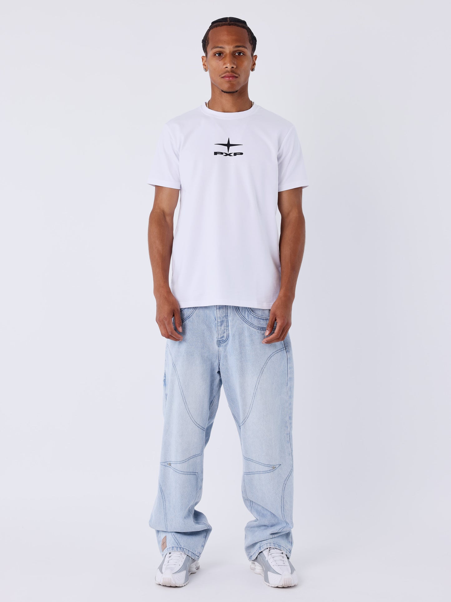 Calça jeans larga em denim azul com costuras Polaris