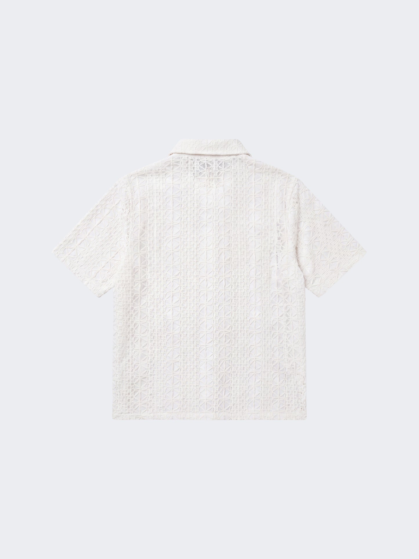 Camisa bordada calada con flor