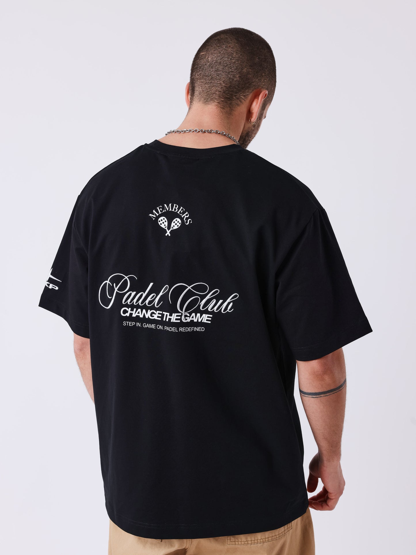 Herr T-shirt med tryck och broderat Champion-motiv
