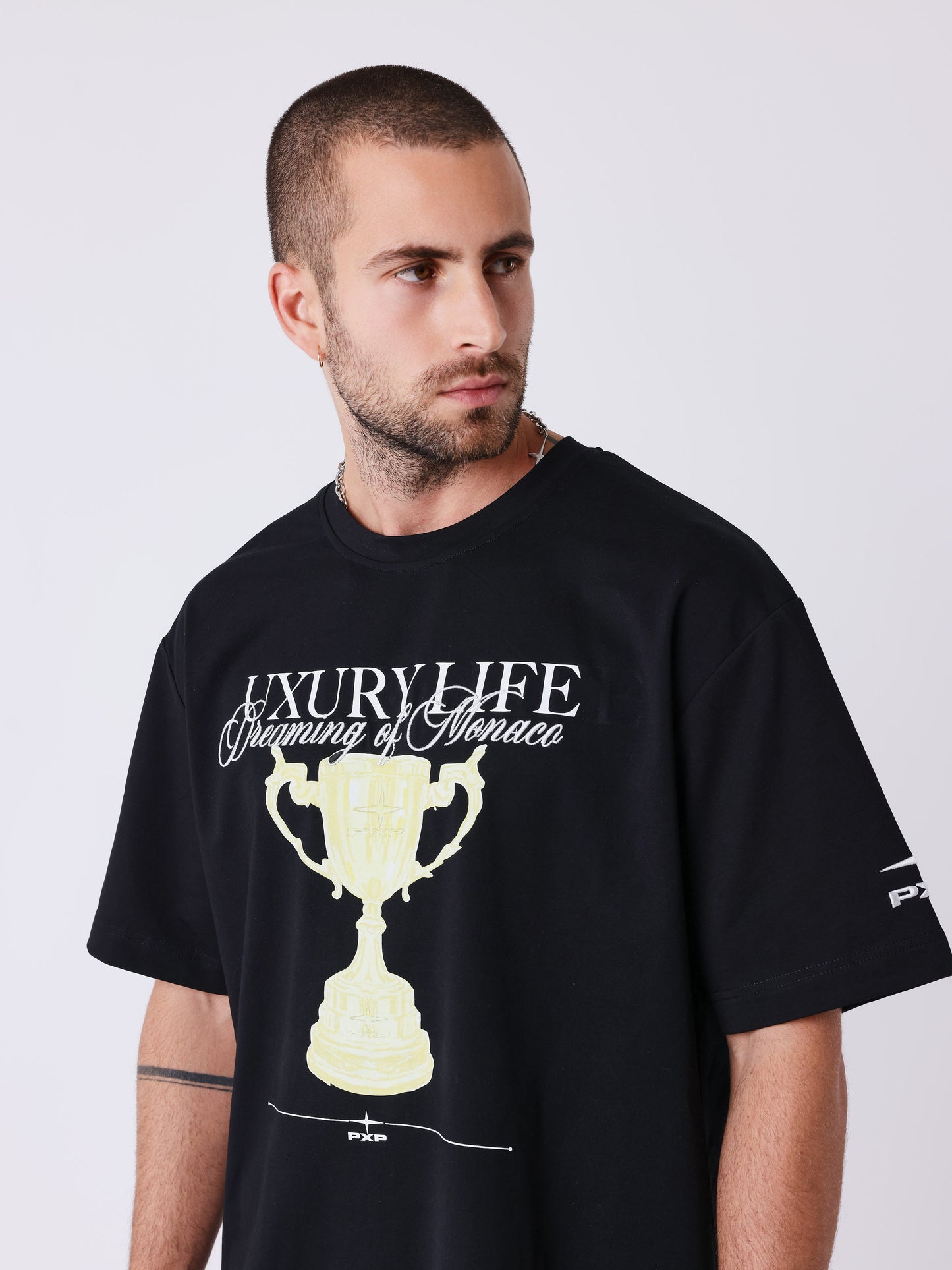 Herr T-shirt med tryck och broderat Champion-motiv