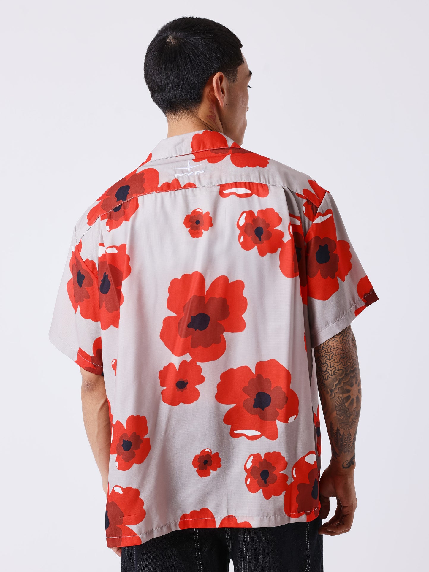 Camicia a maniche corte con motivo floreale