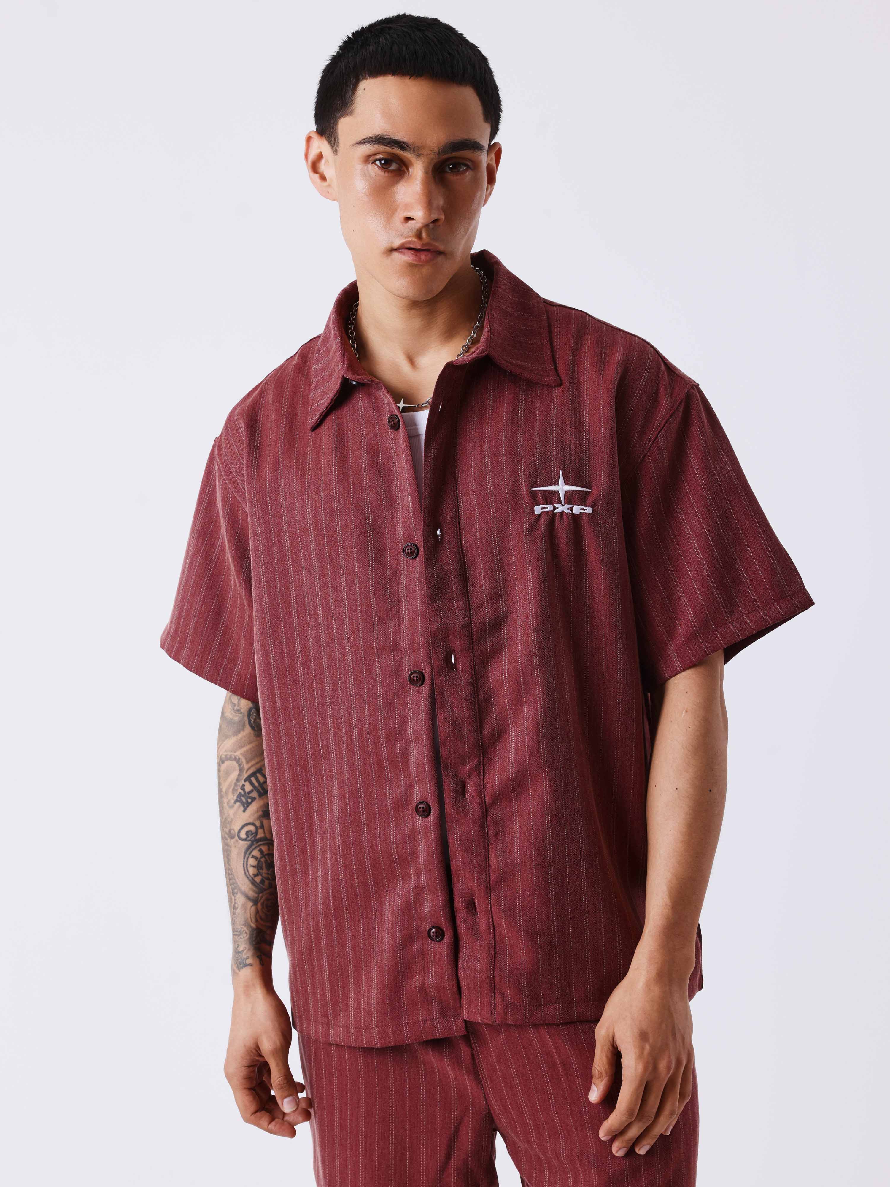 Camisa con estampado de rayas y bordado en la espalda-1