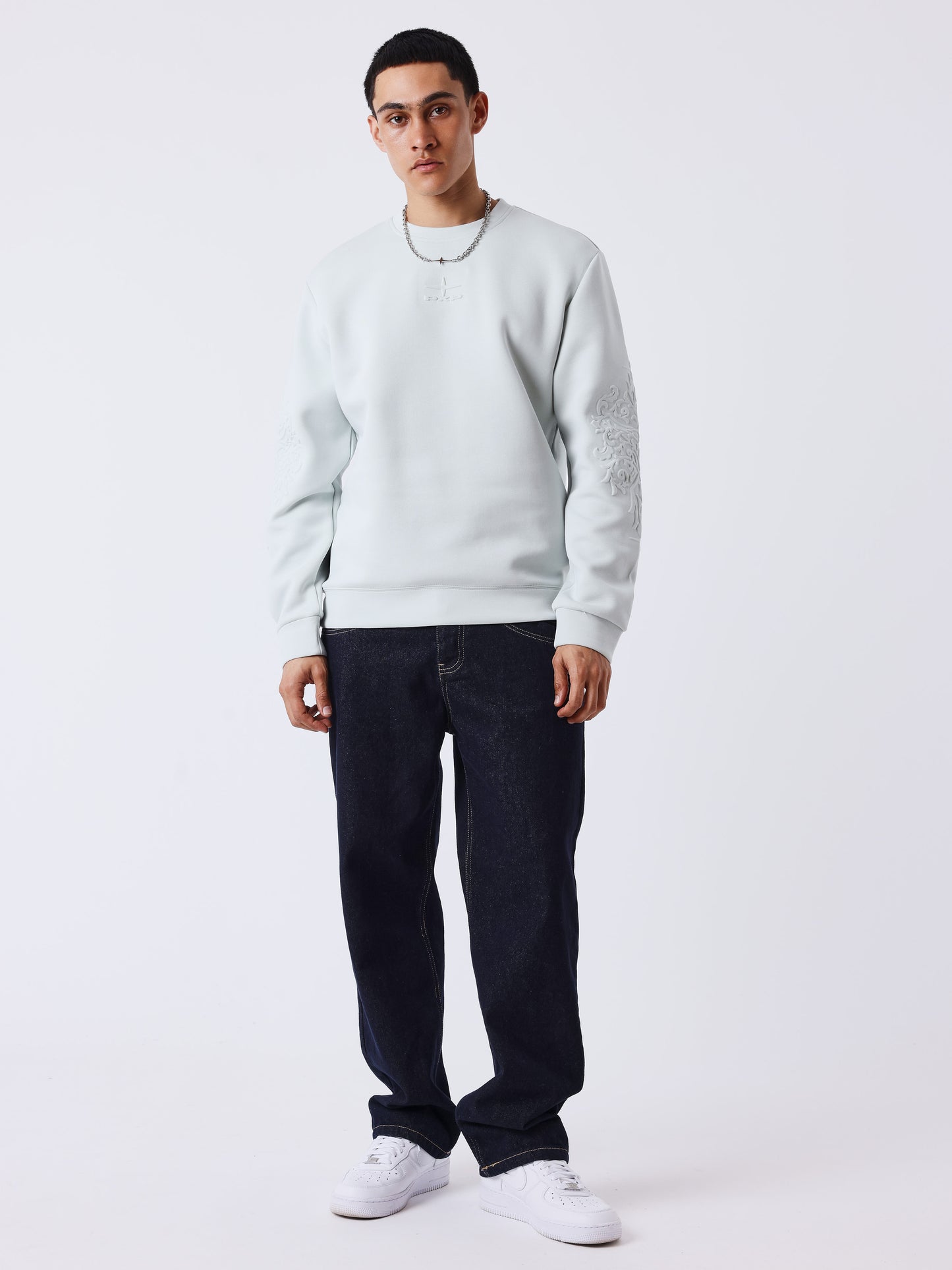Ronde hals sweater met reliëf