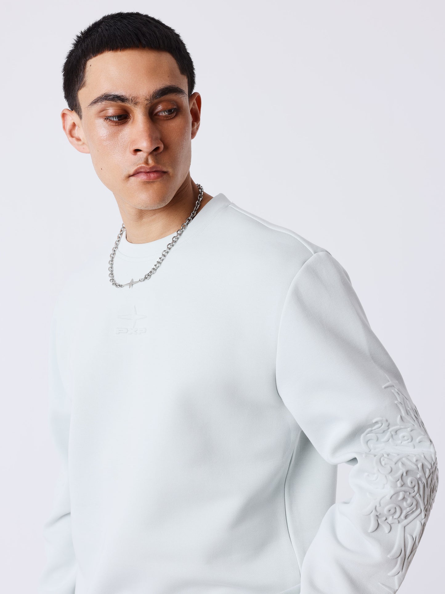 Ronde hals sweater met reliëf