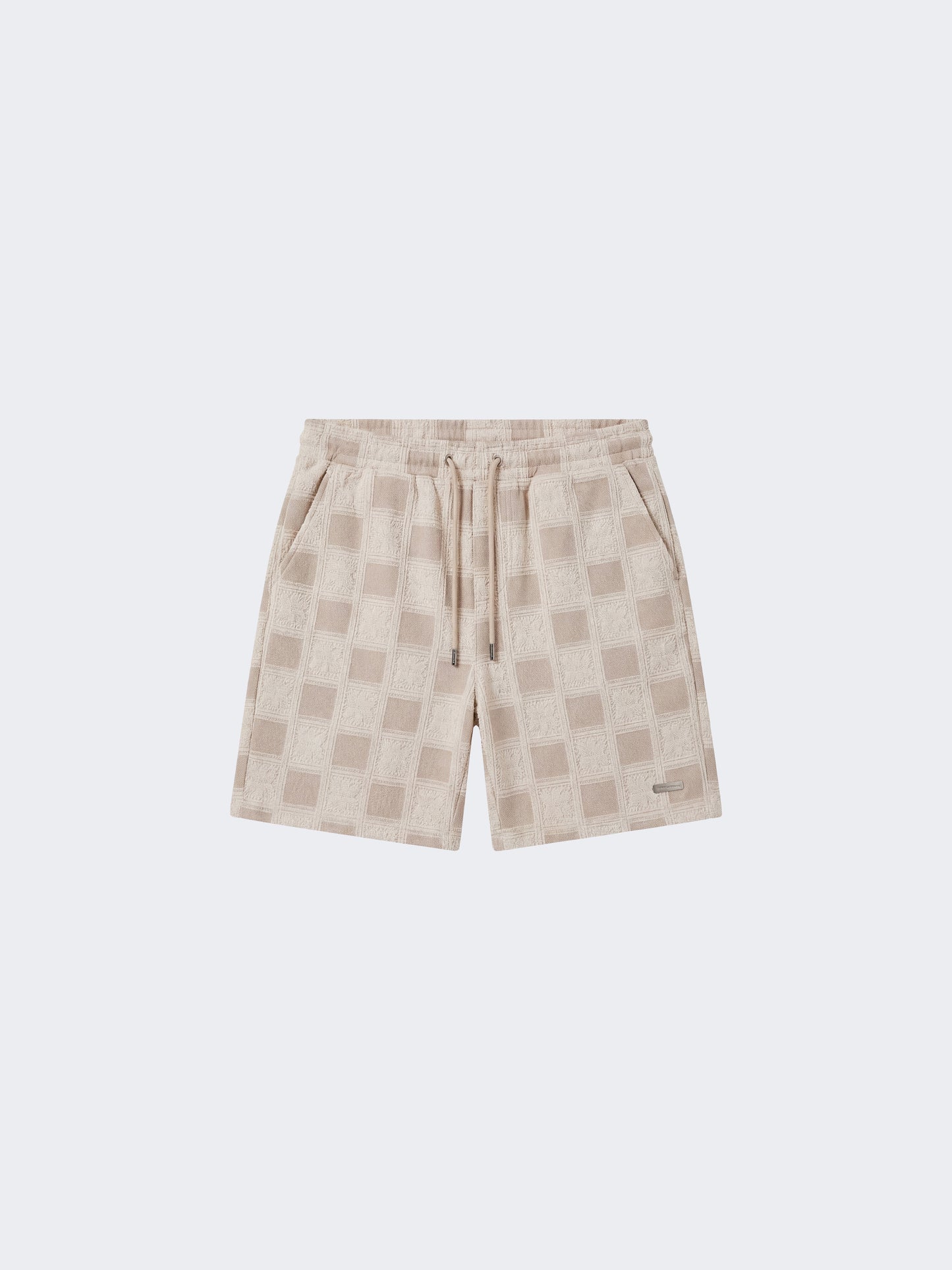 Short homme texturé à motif carreaux