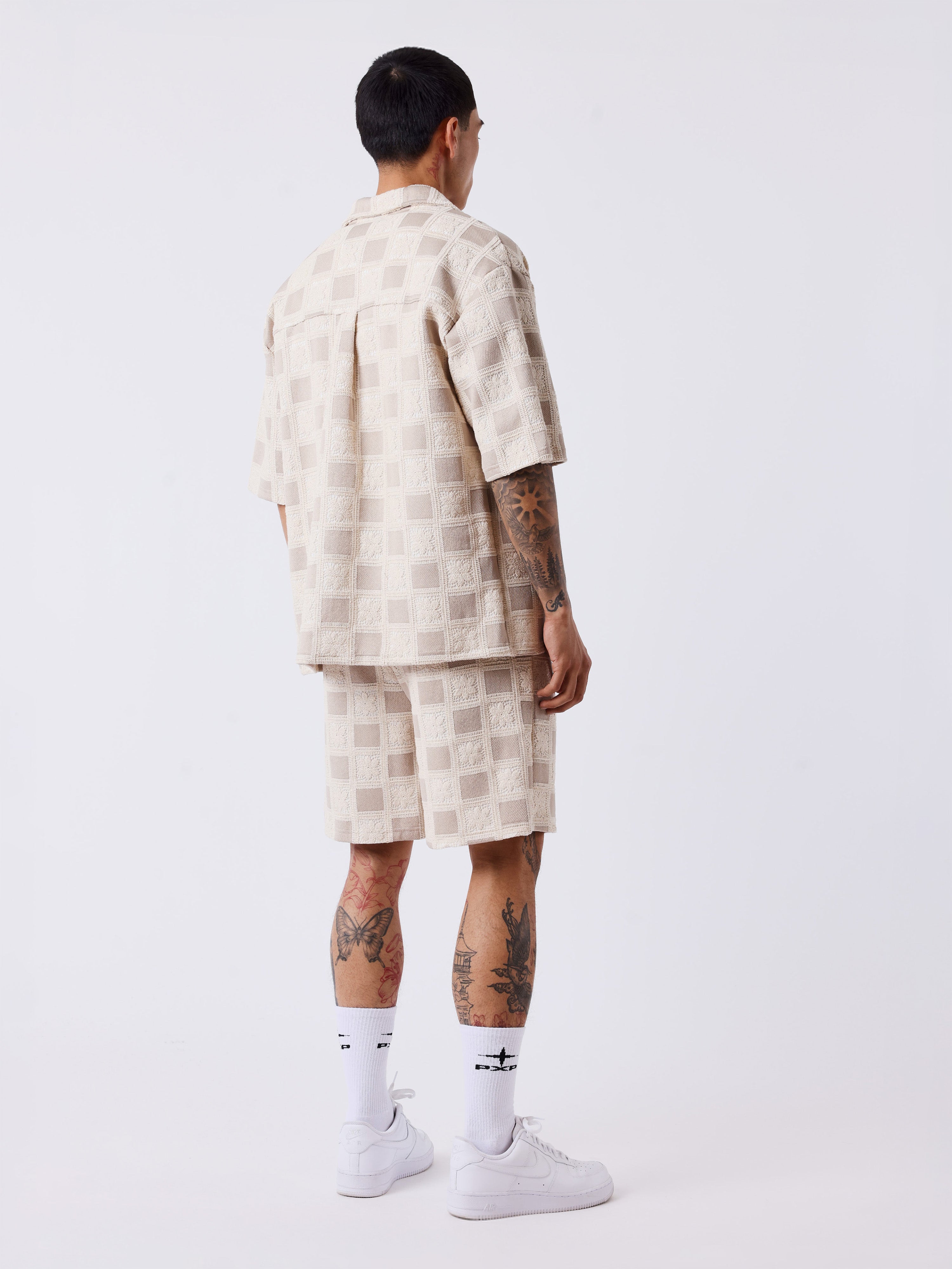 Short homme texturé à motif carreaux-2