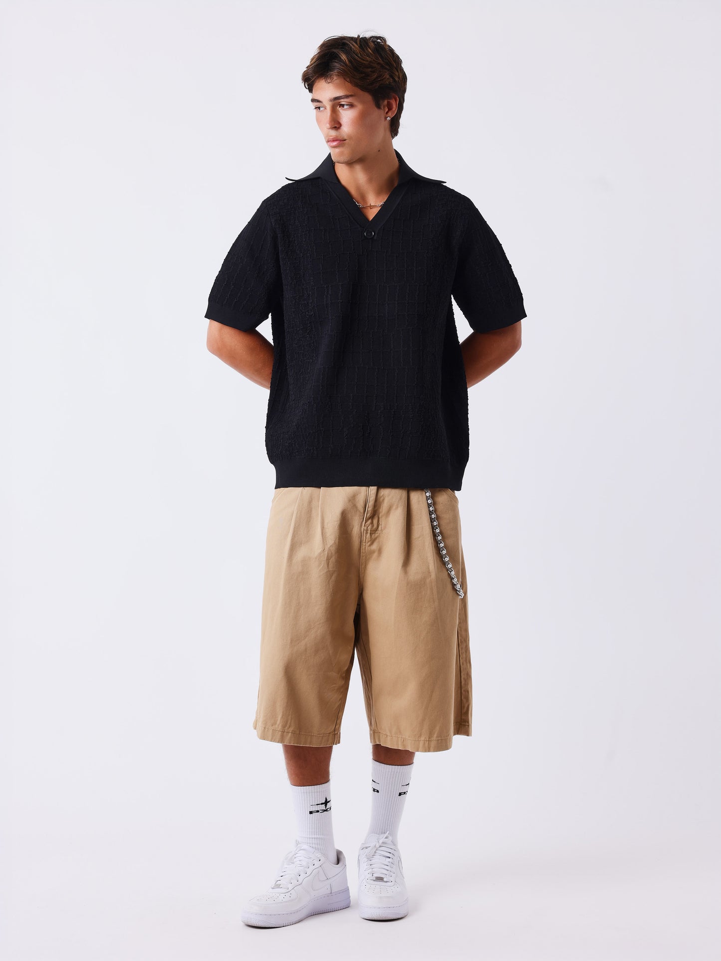 Поло от текстурирана плетка с квадратно каре