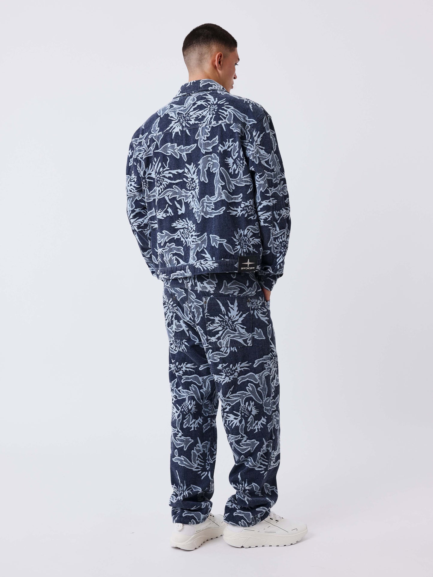 Pantalón de denim jacquard floral