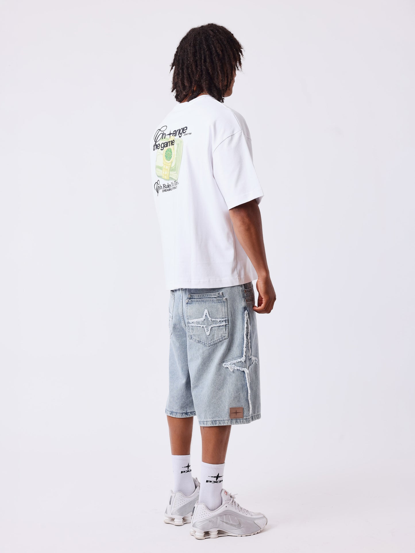 Short denim com detalhes desfiados PXP