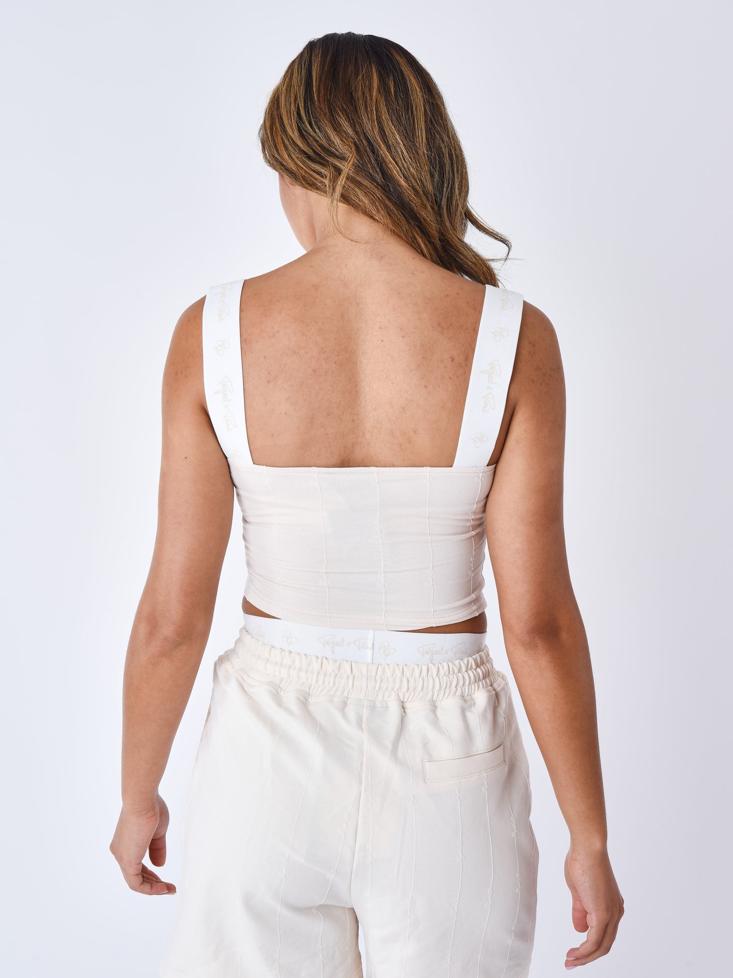 Crop top con spalline