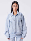 Oversized jakke i lyseblå denim med Polaris stikninger
