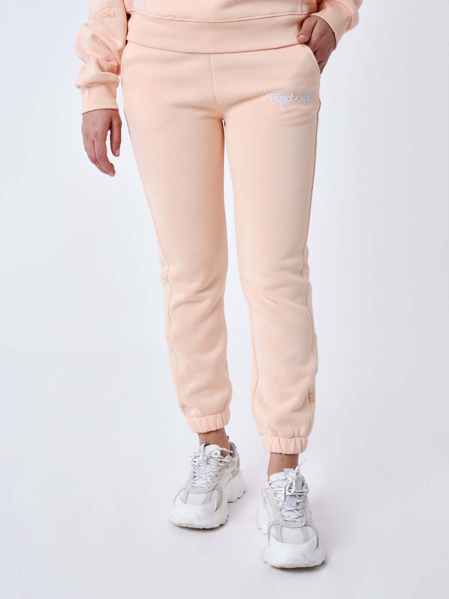 bas-de-jogging-a-bandes-all-over-signature-pale-peach