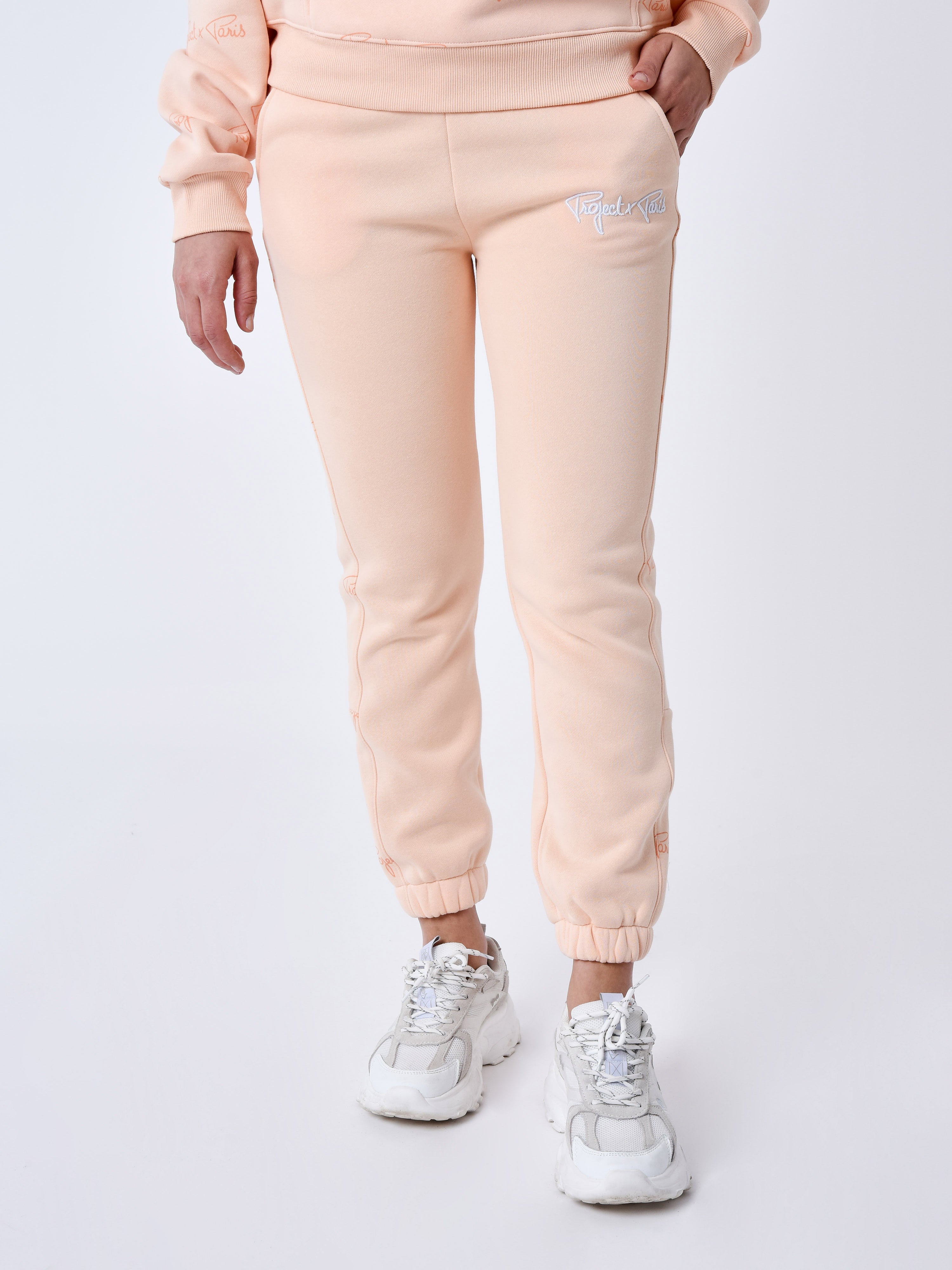 bas-de-jogging-a-bandes-all-over-signature-pale-peach