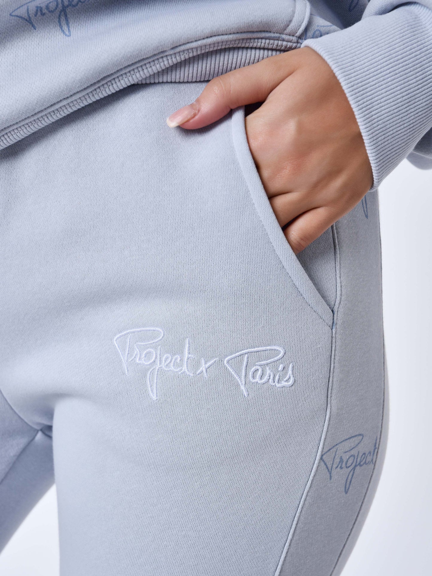 bas-de-jogging-a-bandes-all-over-signature-bleu-glacier