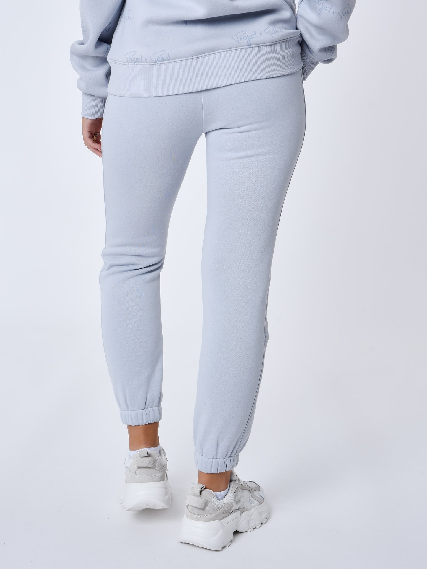 bas-de-jogging-a-bandes-all-over-signature-bleu-glacier