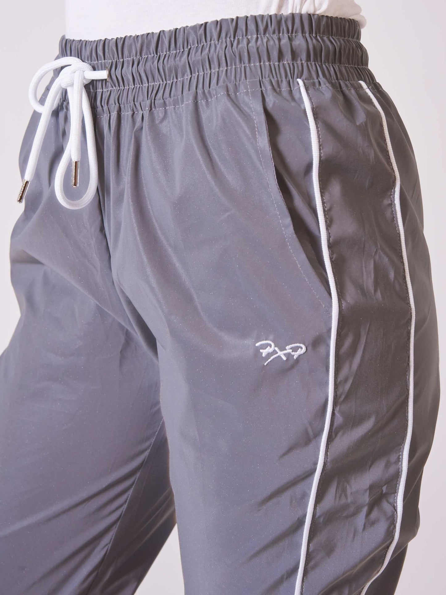Bas de jogging bas élastiqué réfléchissante avec piping