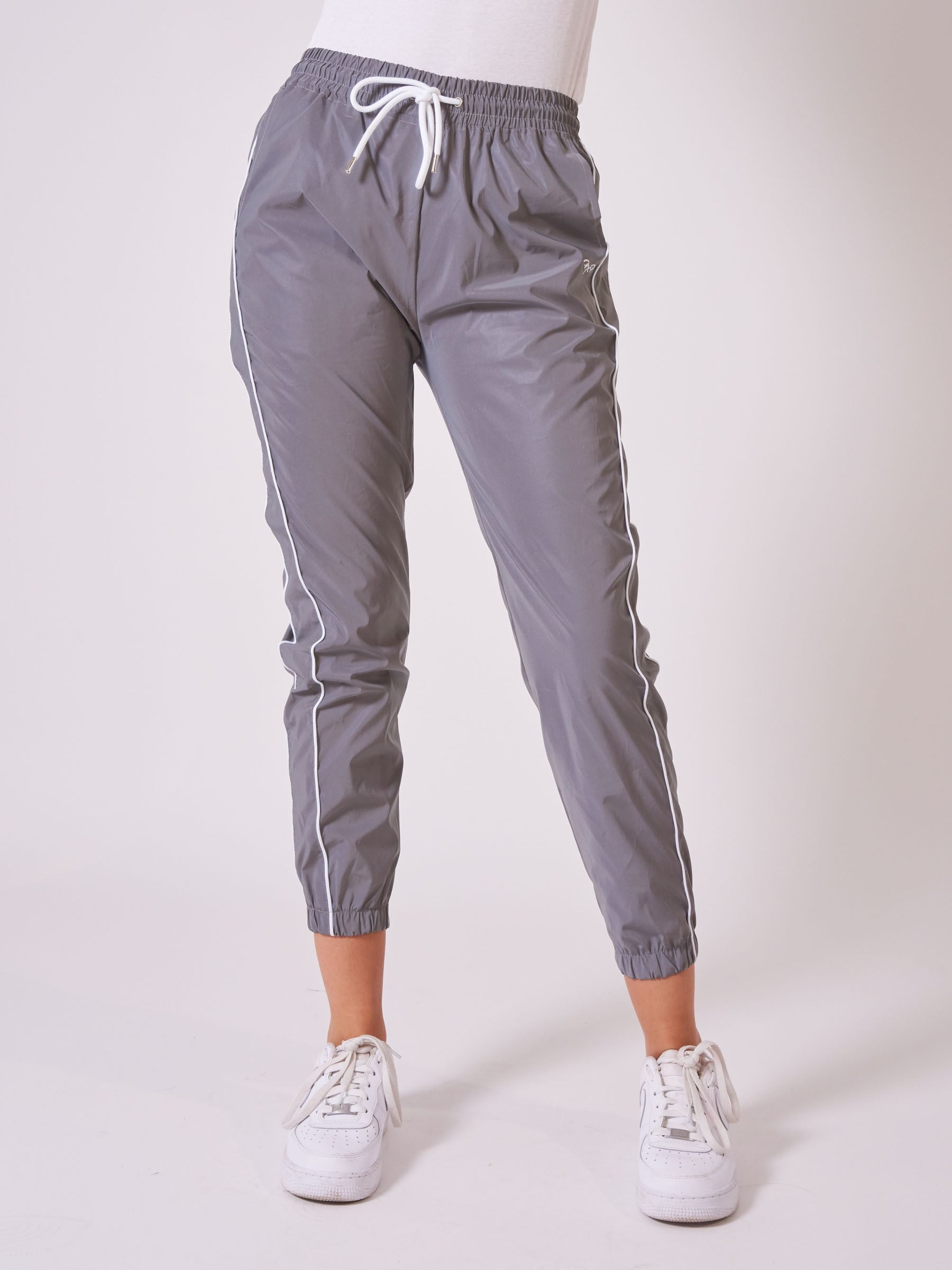 Reflekterende joggebukse med elastisk nederkant og piping-1