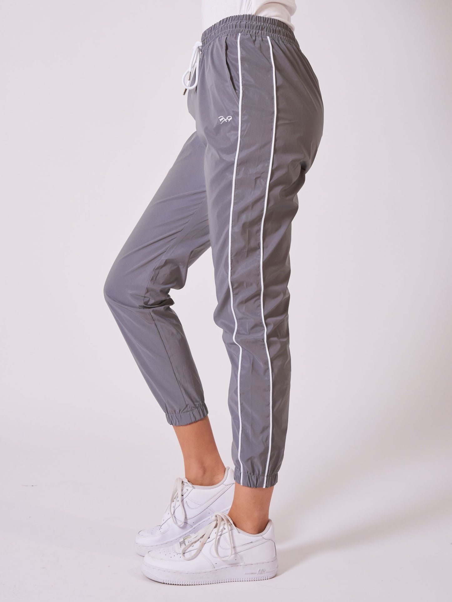 Bas de jogging bas élastiqué réfléchissante avec piping