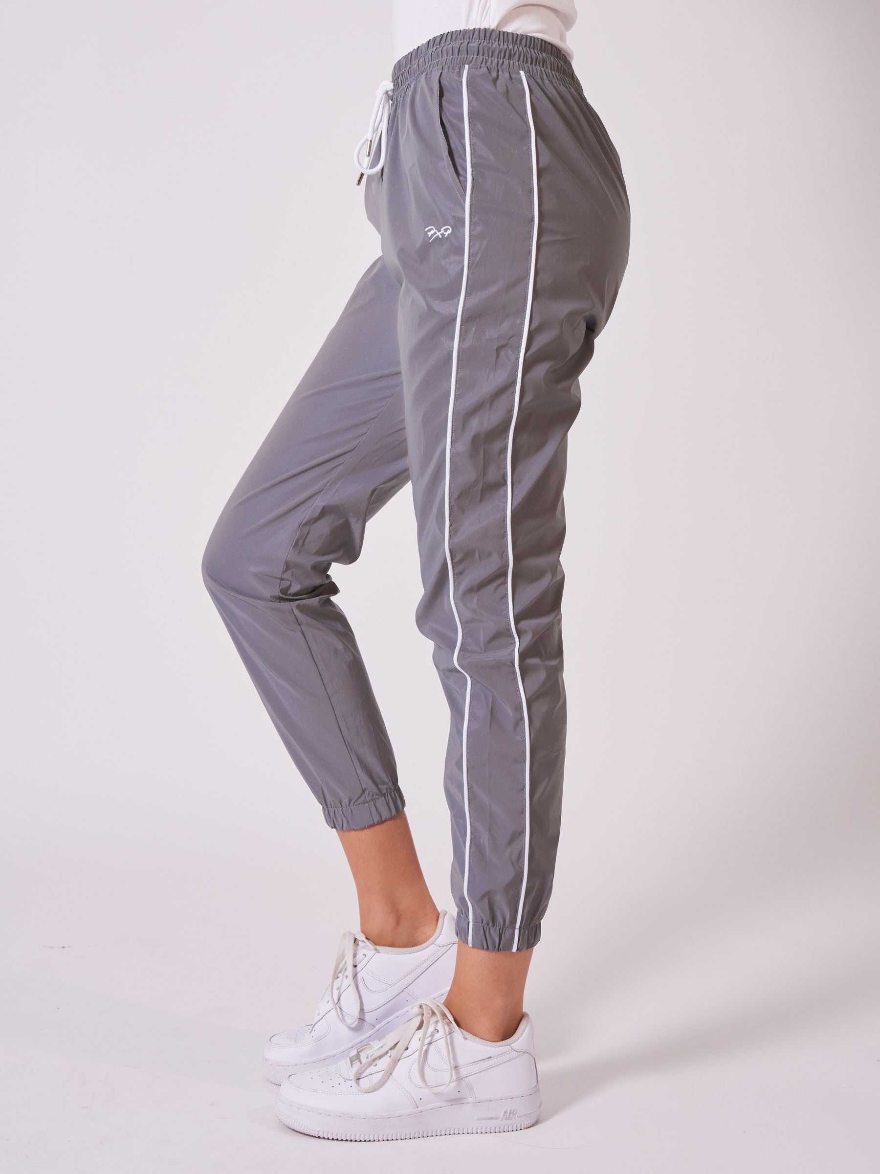 Reflekterende joggebukse med elastisk nederkant og piping-4